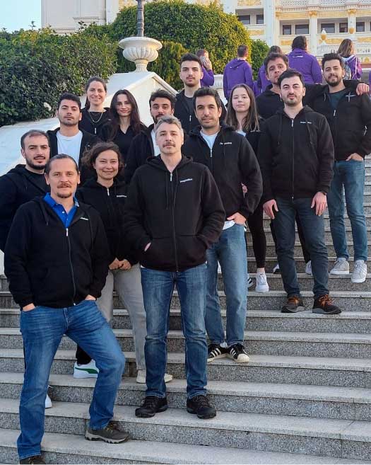 PeopleBox team on the stairs
